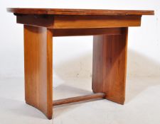 EARLY 20TH CENTURY ART DECO WALNUT DRAW LEAF DINING TABLE