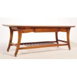 A RETRO VINTAGE MID 20TH CENTURY TEAK COFFEE TABLE