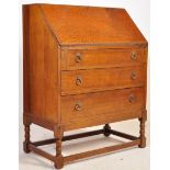 A VINTAGE ARTS & CRAFT REVIVAL OAK BUREAU