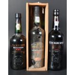 THREE BOTTLES OF COCKBURNS PORT