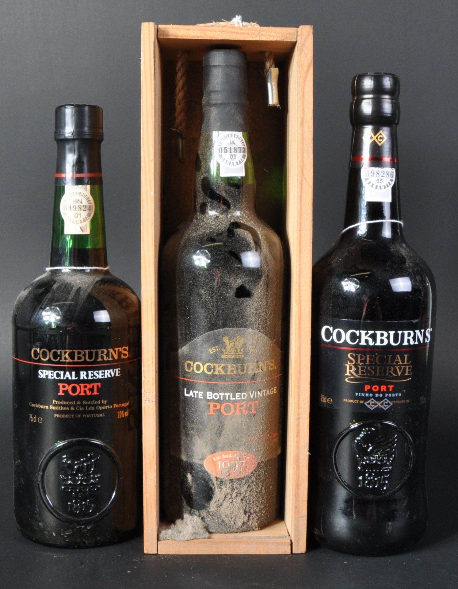 THREE BOTTLES OF COCKBURNS PORT