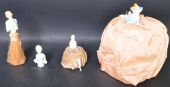 FOUR VICTORIAN PORCELAIN HALF DOLL PINCUSHIONS AND CRUMB BRUSH