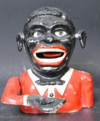 A VINTAGE 1940S NOVELTY CAST IRON MONEY BOX OF MAN