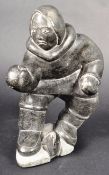 DAVID IRQU - LARGE INUIT CARVED FIGURINE DEPICTING A MAN & FISH