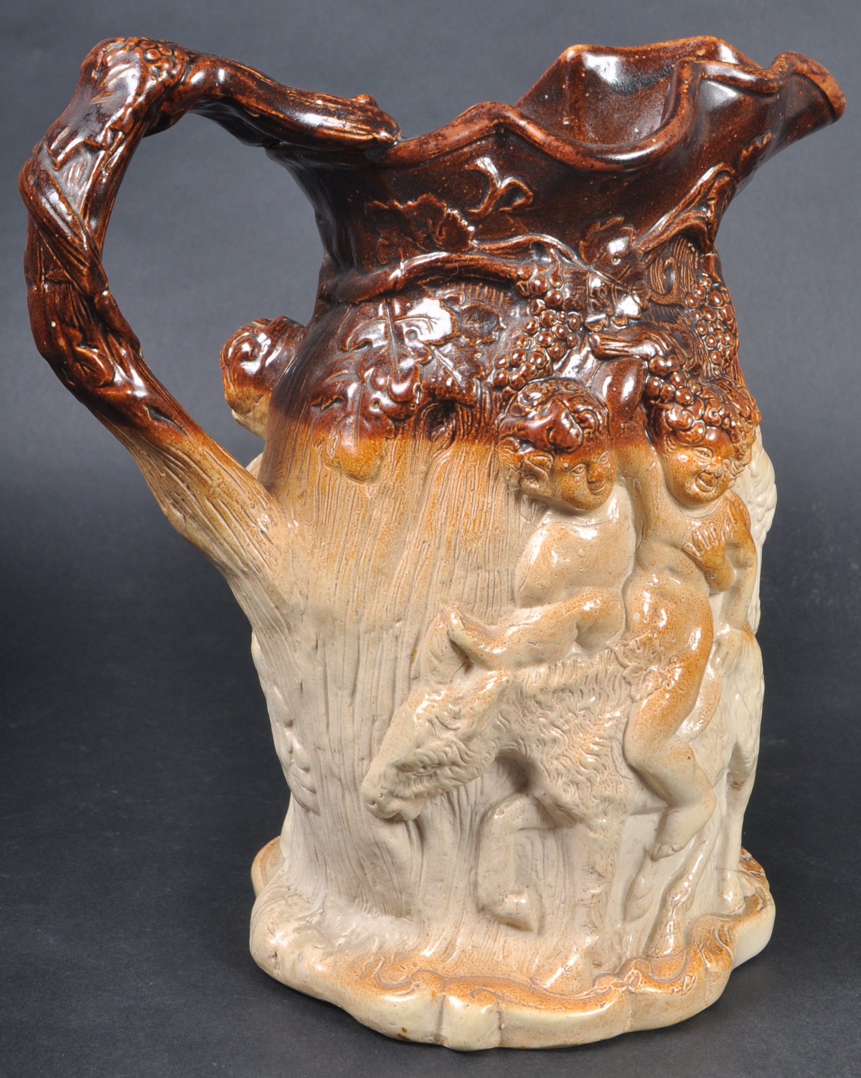 19TH CENTURY BRAMPTON SALT GLAZED SATYR JUG