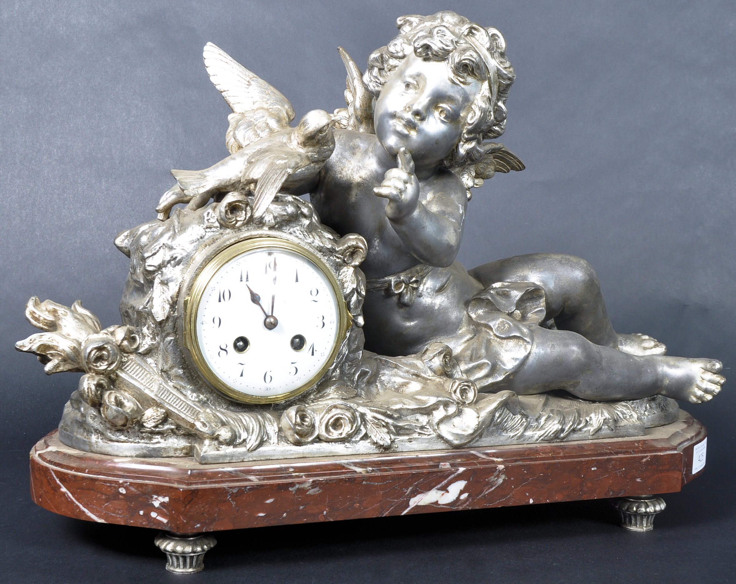 19TH CENTURY FRENCH CHERUB MANTEL CLOCK ON MARBLE BASE