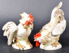 PAIR OF 19TH CENTURY GERMAN PORCELAIN FIGHTING COCKERELS