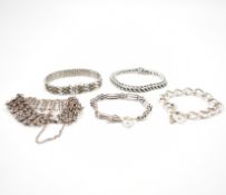 COLLECTION OF SILVER CHAIN BRACELETS