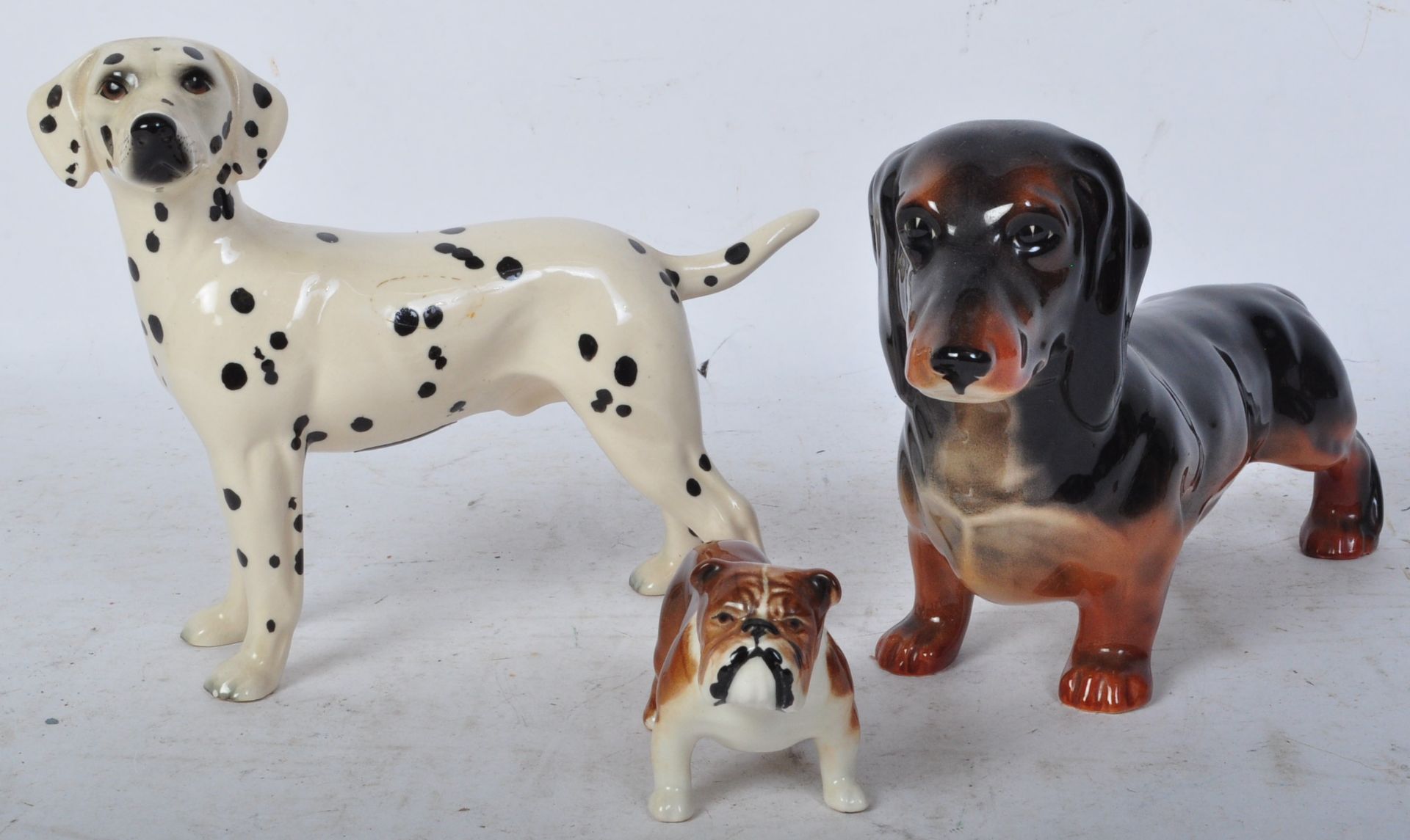 THREE VINTAGE PORCELAIN DOG FIGURES - BESWICK