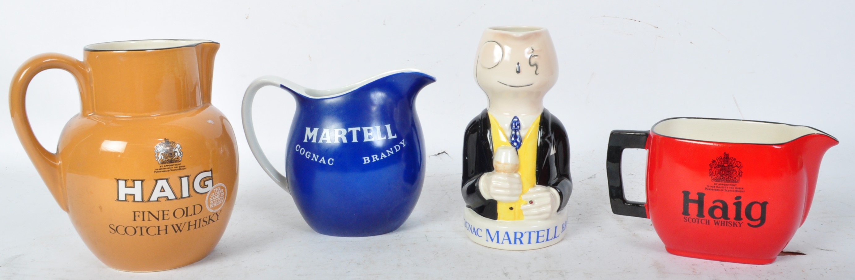 COLLECTION OF MID CENTURY ADVERTISING WHISKEY JUGS