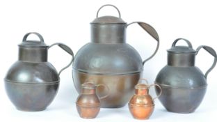 FIVE VINTAGE COPPER MILK JUGS - J. T. LAINE & MARTINS