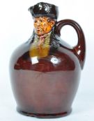 AN EARLY 20TH CENTURY ROYAL DOULTON KINGSWARE BILL SYKES WHISKEY FLAGON