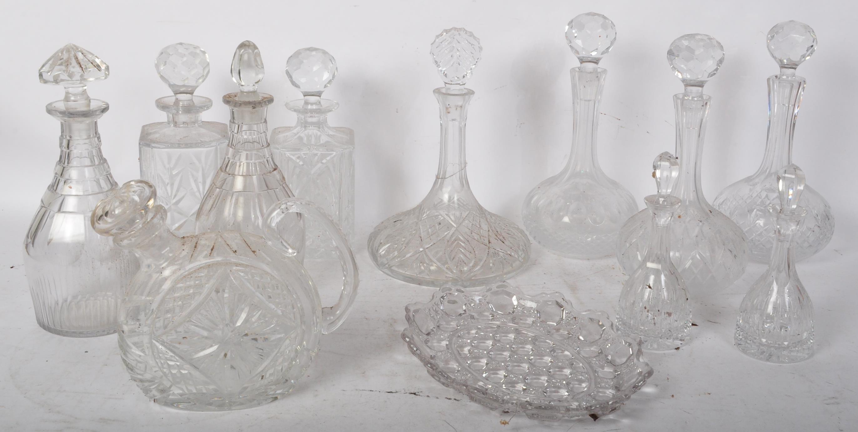 COLLECTION OF VINTAGE CUT GLASS DECANTERS
