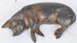 BRONZE PAPERWEIGHT IN THE FORM OF A PIG