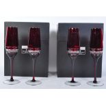 SET OF FOUR JOHN ROCHA FOR WATERFORD CRYSTAL RUBY FLUTE GLASSES