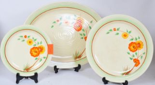 COLLECTION OF THREE ART DECO CLARICE CLIFF COROLLA PLATES