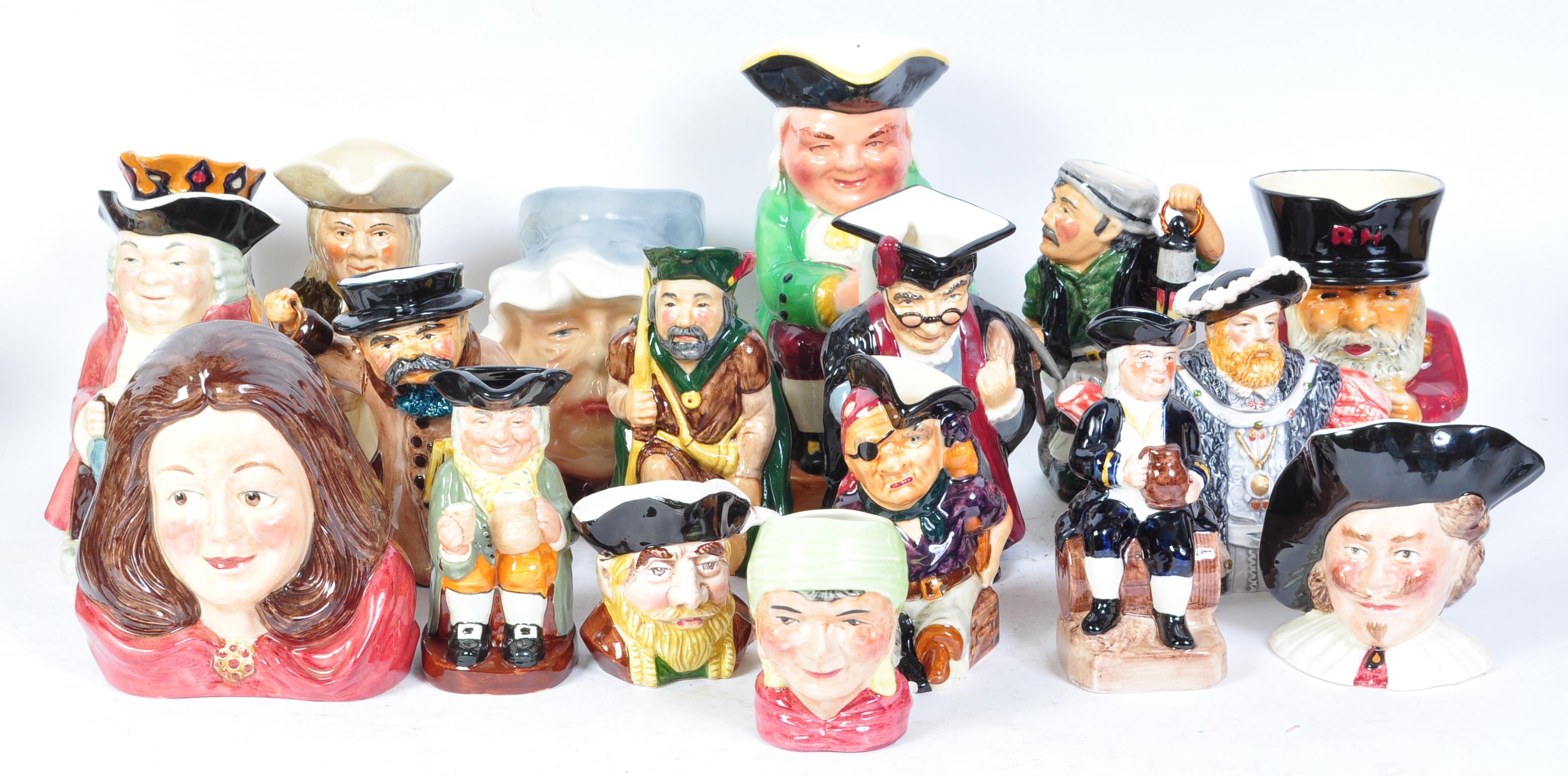 A LARGE COLLECTION OF VINTAGE CERAMIC TOBY JUGS