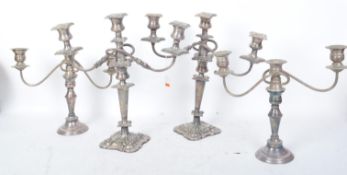 TWO PAIRS OF EARLY 20TH CENTURY SILVER PLATED CANDELABRA