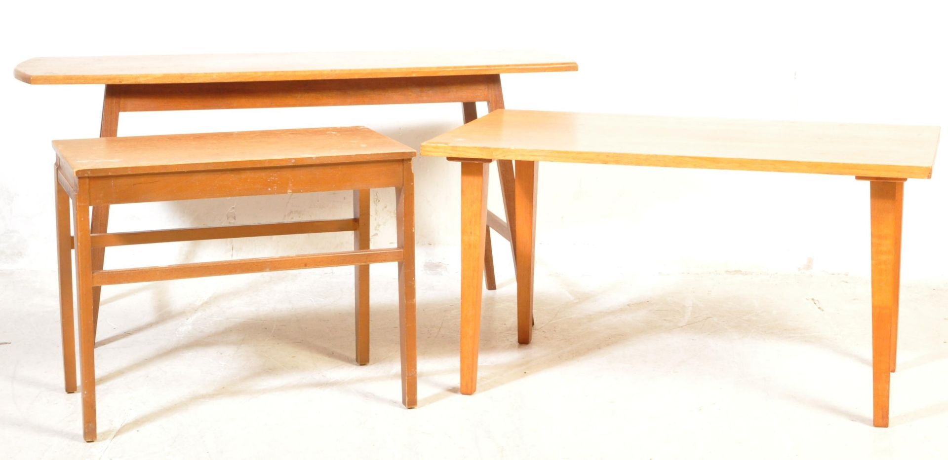 COLLECTION OF THREE MID CENTURY TEAK COFFEE TABLES