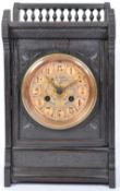 A VICTORIAN EIGHT DAY OAK CASED MANTEL CLOCK