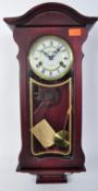 A LINCOLN 31 DAY MAHOGANY WALL CLOCK