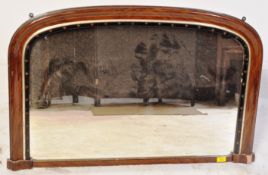 A VICTORIAN MAHOGANY OVER MANTLE ARCH TOP MIRROR