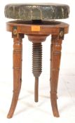 A VICTORIAN MAHOGANY REVOLVING PIANO STOOL OF CIRCULAR FORM