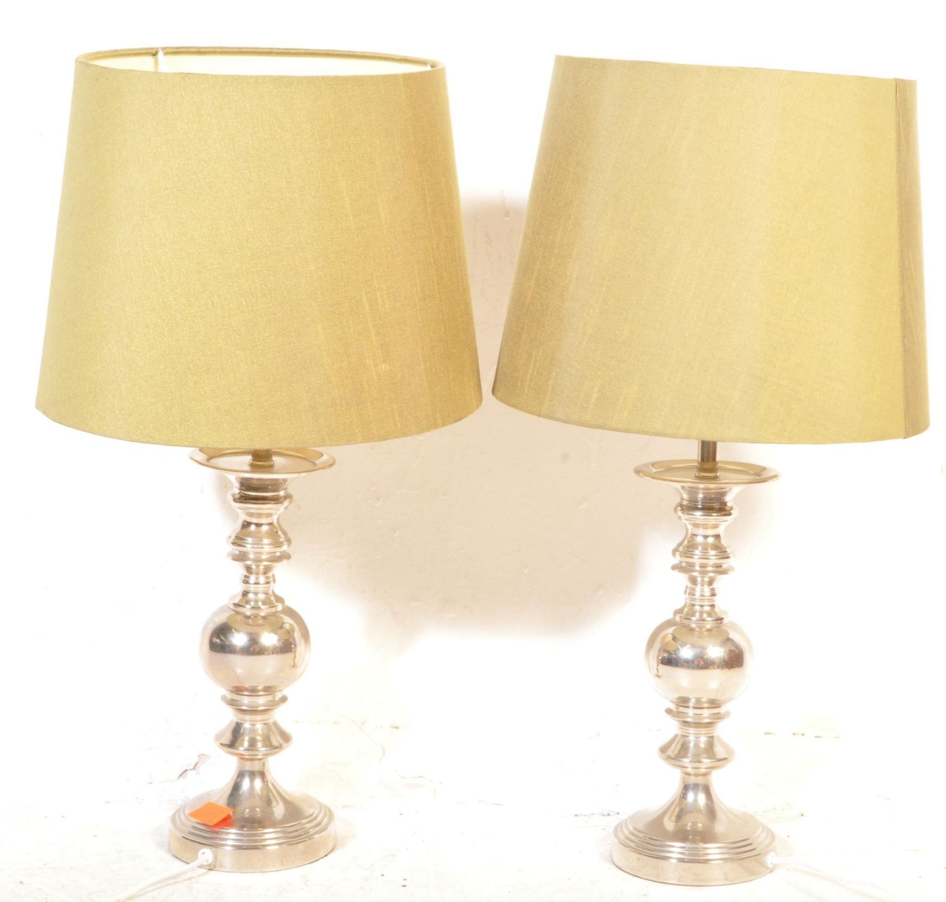 A PAIR OF CONTEMPORARY CHROME FINISH TABLE LAMPS