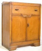 1930S OAK TWIN DOOR CABINET