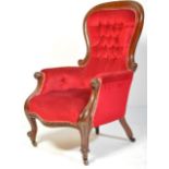 A VICTORIAN MAHOGANY UPHOLSTERED LIBRARY ARMCHAIR