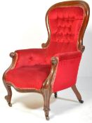 A VICTORIAN MAHOGANY UPHOLSTERED LIBRARY ARMCHAIR