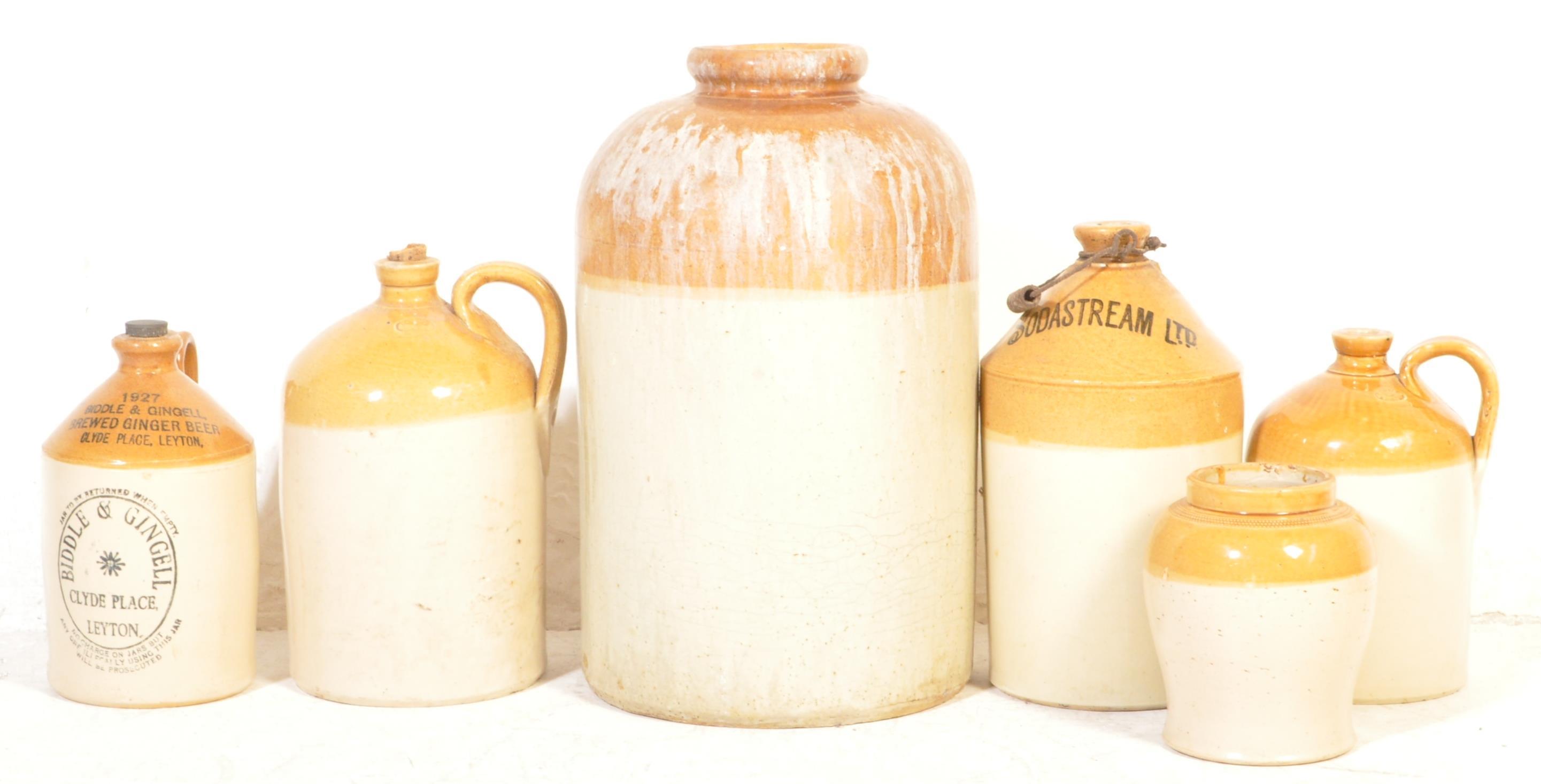 COLLECTION OF 1920S STONEWARE WATER FLAGONS