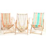 THREE VINTAGE STRIPED BEACH DECK CHAIRS