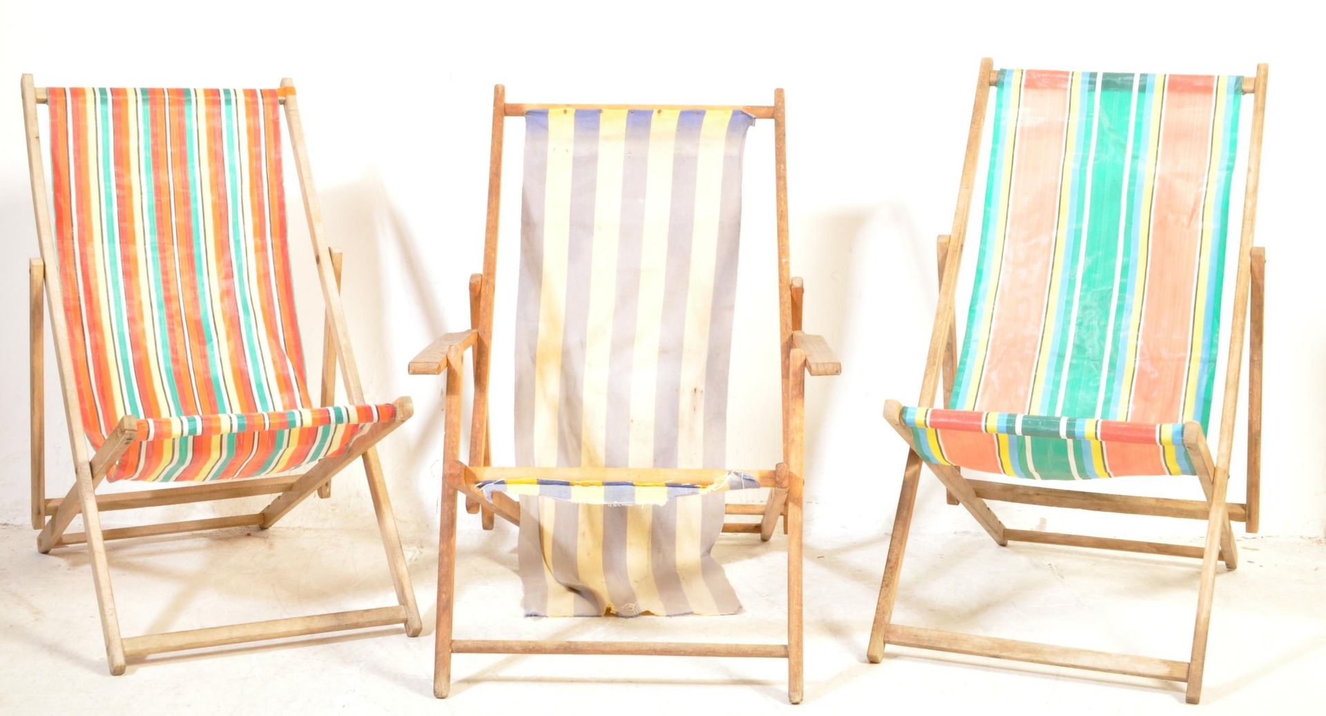 THREE VINTAGE STRIPED BEACH DECK CHAIRS