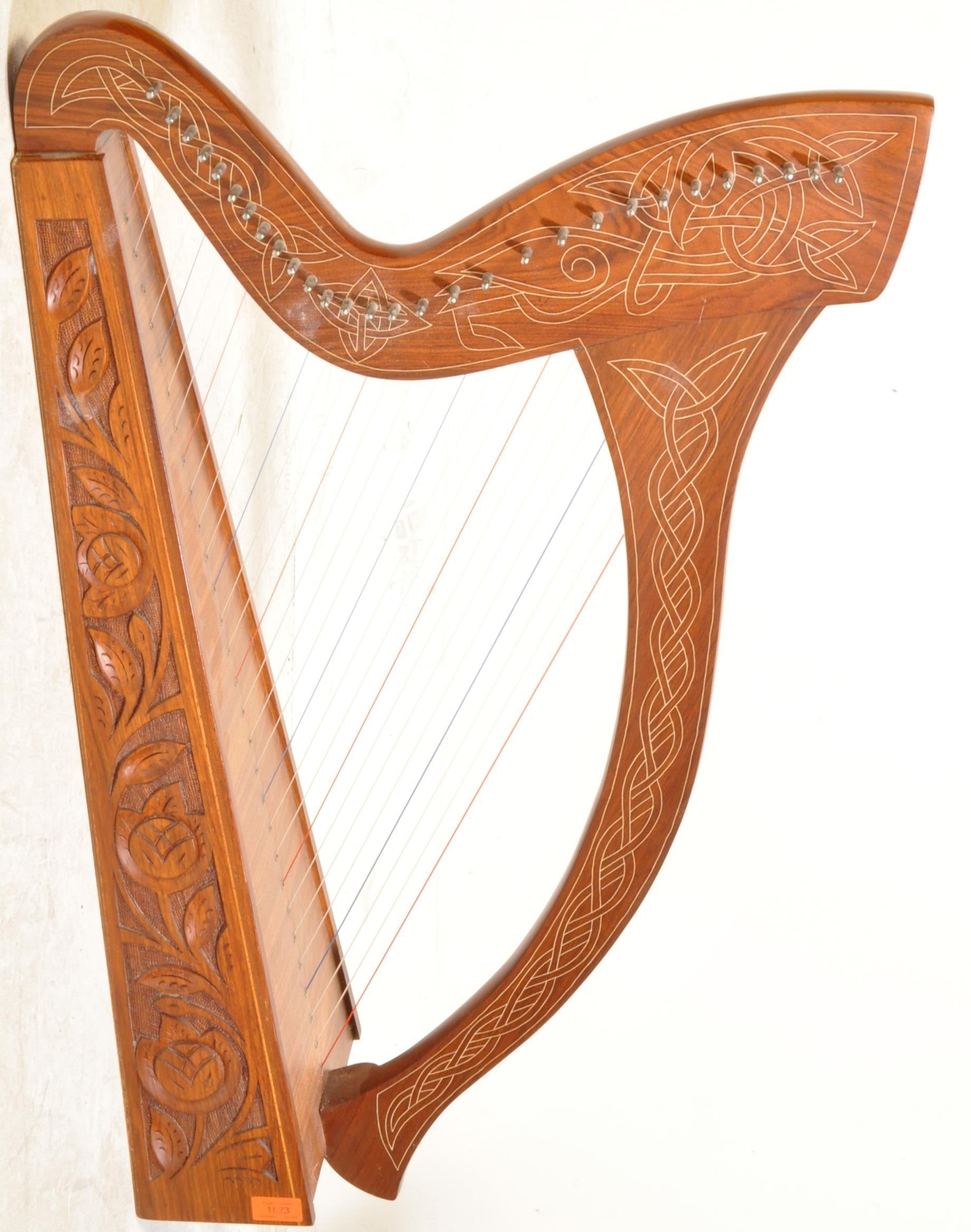 VINTAGE WOODEN TWENTY-SEVEN STRING CARVED KNEE HARP