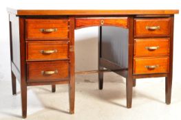 A MID 20TH CENTURY OAK TWIN PEDESTAL DESK