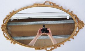 VINTAGE METAL GILT OVAL MIRROR