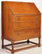 A 1920'S OAK ARTS & CRAFT REVIVAL OAK BUREAU