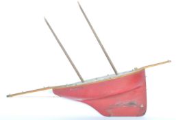 AN EDWARDIAN WOODEN-HULLED POND YACHT MODEL