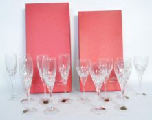 TWO SETS OF SIX TAILLE MAIN CHAMPAGNE FLUTE GLASSES