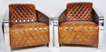 ANDREW MARTIN - MATCHING PAIR OF AVIATION ARMCHAIRS
