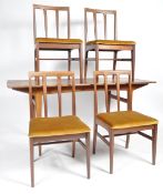 YOUNGER TEAK WOOD DINING TABLE AND FOUR CHAIRS