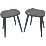 ERCOL - MODEL 425 - PAIR OF EBONISED SADDLE STOOLS