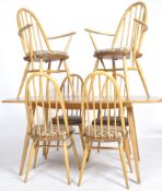 ERCOL - DINING TABLE AND MATCHING SET OF SIX CHAIRS