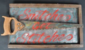 SNITCHES GET STITCHES - VINTAGE METAL AND WOOD SIGN