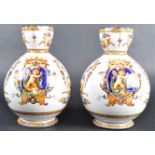 PAIR OF MID 19TH CENTURY ITALIAN FAIENCE POTTERY JUGS