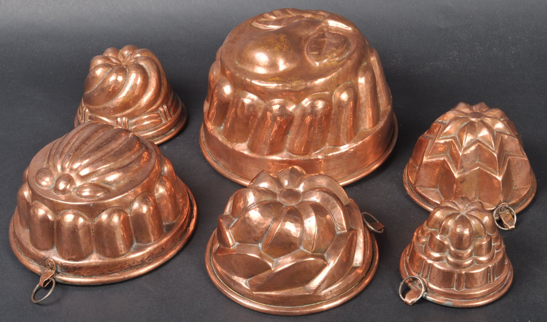 COLLECTION OF EDWARDIAN COPPER JELLY MOLDS