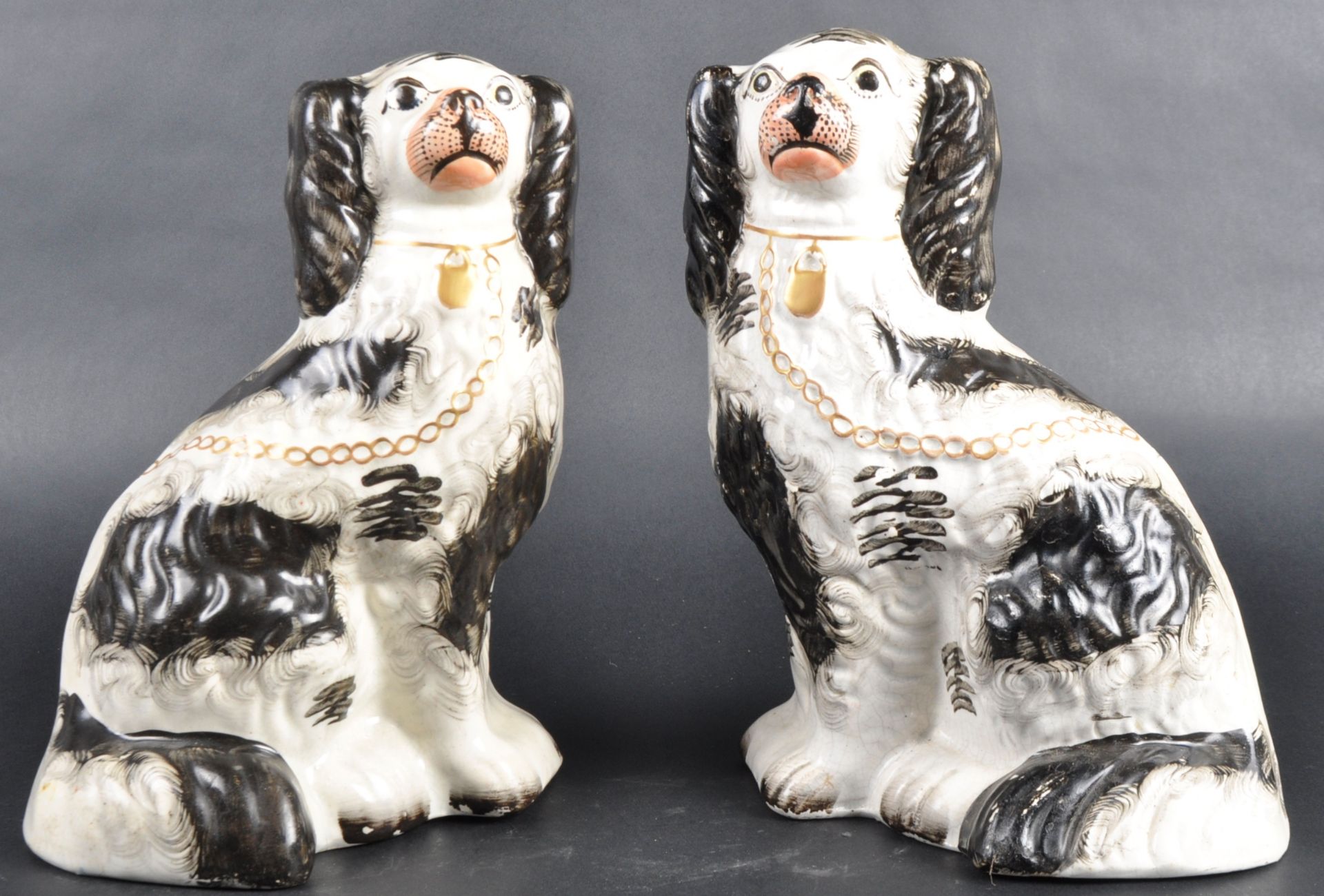 PAIR OF 19TH CENTURY STAFFORDSHIRE FIRESIDE SPANIELS