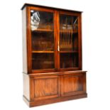 EARLY 19TH CENTURY MAHOGANY CABINET ON BASE