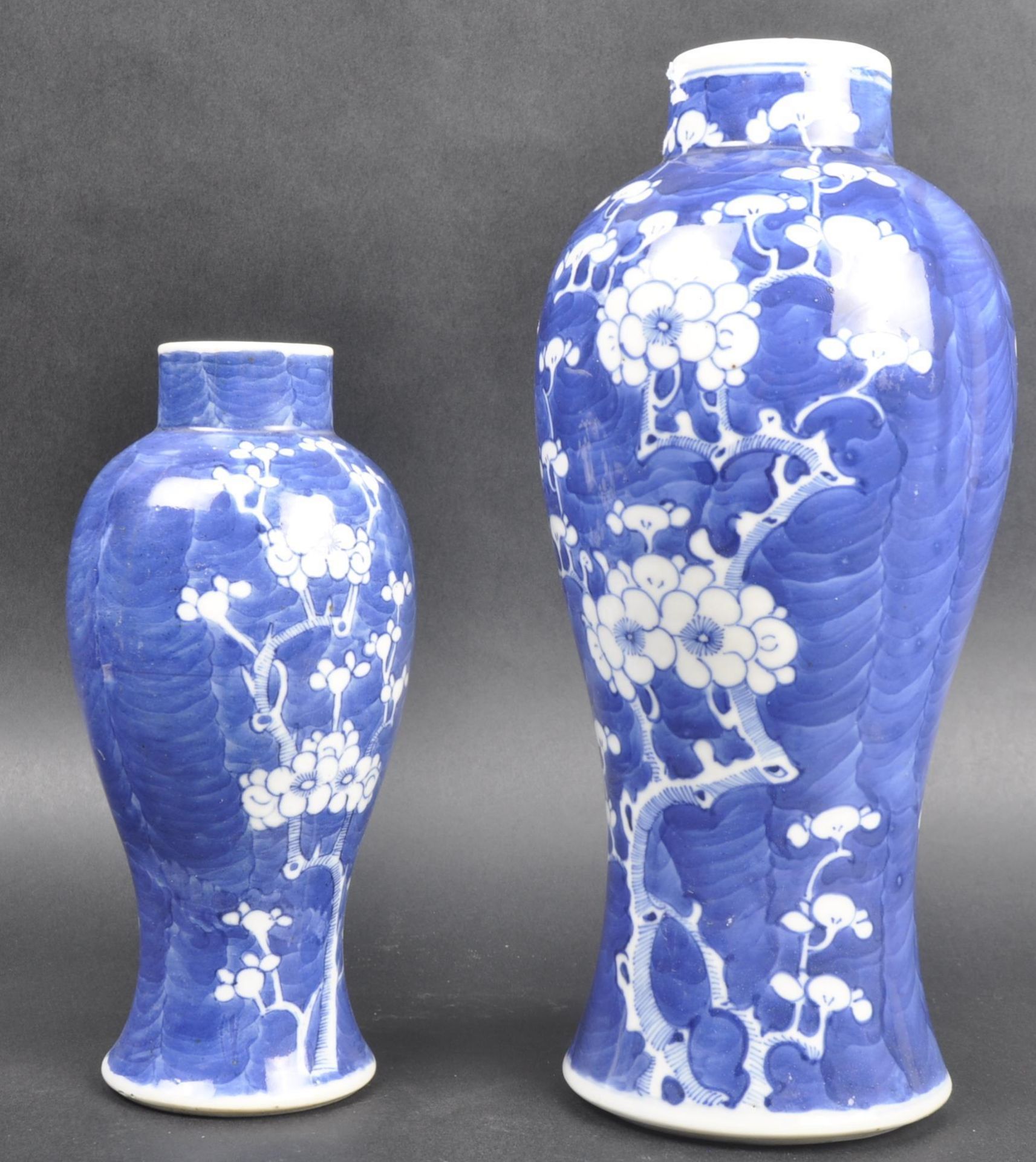 GRADUATING PAIR OF CHINESE PRUNUS PATTERN VASES